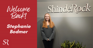 Image of returning SR Intern, Stephanie Bodmer, in front of ShindelRock sign
